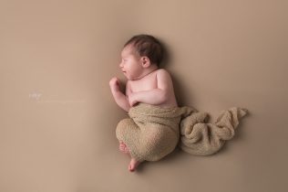 Newborn smiling